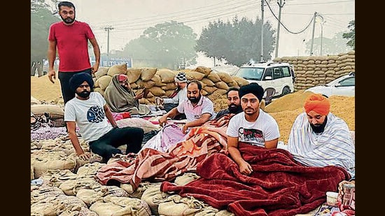 Former MLA Lakhvir Singh Lakh at the grain market. (HT Photo)
