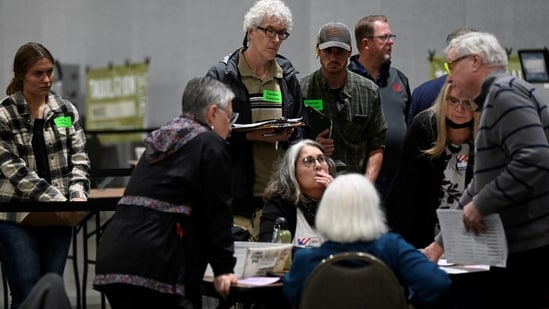 Election observers watch electoral officials working at the central count in Baird center, during the 2024 U.S. presidential election, in Milwaukee, Wisconsin, U.S., November 5, 2024.(REUTERS)
