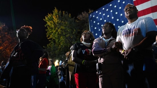 Supporters watch poll results come in during an election night event for Democratic presidential nominee, U.S. Vice President Kamala Harris at Howard University on November 05, 2024 in Washington, DC.(Getty Images via AFP)