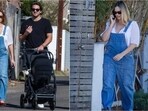 In her first public outing since giving birth, Margot Robbie looks stylish in denim jumpsuit and red flats. 