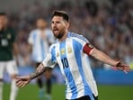 Lionel Messi celebrates after scoring a goal for Argentina. Lionel Messi celebrates after scoring a goal for Argentina.