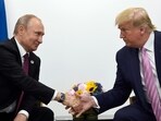 FILE - In this June 28, 2019, file photo, Donald Trump shakes hands with Russian President Vladimir Putin during a bilateral meeting on the sidelines of the G-20 summit in Osaka, Japan.