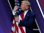 Donald Trump kissed and hugged the American flag ahead of his speech. Donald Trump kissed and hugged the American flag ahead of his speech.