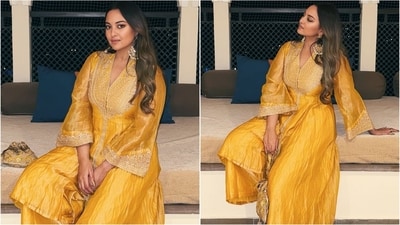 She accessorised her look with golden statement kundan earrings and golden potli bag. With minimal makeup and loose tresses, she finished off her look. (Instagram/@aslisona) She accessorised her look with golden statement kundan earrings and golden potli bag. With minimal makeup and loose tresses, she finished off her look. (Instagram/@aslisona)