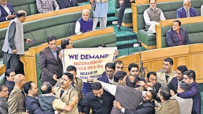A scuffle broke out between legislators inside the J&K assembly on Thursday. (Waseem Andrabi) A scuffle broke out between legislators inside the J&K assembly on Thursday. (Waseem Andrabi)