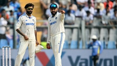 India's Ravindra Jadeja (L) and captain Rohit Sharma in action. (AFP) India's Ravindra Jadeja (L) and captain Rohit Sharma in action. (AFP)