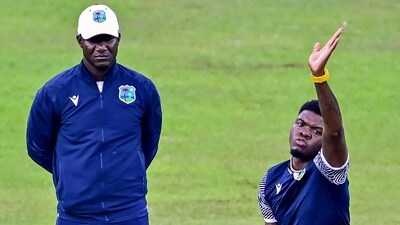 West Indies' Alzarri Joseph (R) and head coach Daren Sammy (AFP) West Indies' Alzarri Joseph (R) and head coach Daren Sammy (AFP)