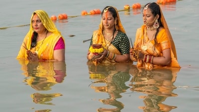 Devotees worship the setting sun during Chhath Puja, at the Ganga Ghat in Kolkata. Chhath is mostly celebrated in Bihar, Jharkhand, Uttar Pradesh, and Nepal. (PTI) Devotees worship the setting sun during Chhath Puja, at the Ganga Ghat in Kolkata. Chhath is mostly celebrated in Bihar, Jharkhand, Uttar Pradesh, and Nepal. (PTI)