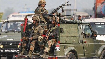 Jammu: Army personnel keep vigil near the site after terrorists fired at an ambulance that was part of an Army convoy passing through a village near the LoC in Akhnoor sector of Jammu and Kashmir on Monday. (PTI) Jammu: Army personnel keep vigil near the site after terrorists fired at an ambulance that was part of an Army convoy passing through a village near the LoC in Akhnoor sector of Jammu and Kashmir on Monday. (PTI)