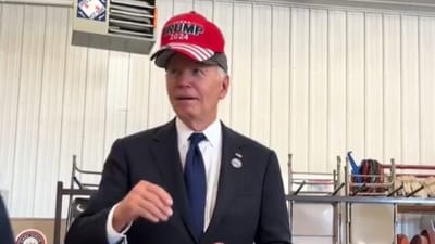 Biden shocks netizens as he wears red Trump hat during Shanksville visit (@CollinRugg/X) Biden shocks netizens as he wears red Trump hat during Shanksville visit (@CollinRugg/X)