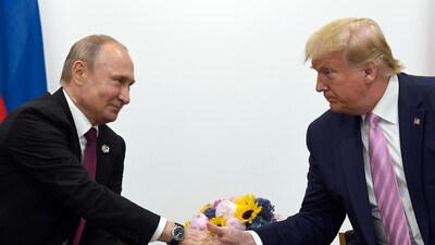 FILE - In this June 28, 2019, file photo, Donald Trump shakes hands with Russian President Vladimir Putin during a bilateral meeting on the sidelines of the G-20 summit in Osaka, Japan. (AP) FILE - In this June 28, 2019, file photo, Donald Trump shakes hands with Russian President Vladimir Putin during a bilateral meeting on the sidelines of the G-20 summit in Osaka, Japan. (AP)