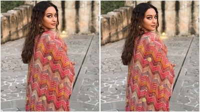 She accessorized her look with a silver oxidized choker necklace, statement earrings, and rings adorning her fingers. Her outfit is from Rimple and Harpreet and costs <span class='webrupee'>₹</span>98,500. (Instagram/@aslisona) She accessorized her look with a silver oxidized choker necklace, statement earrings, and rings adorning her fingers. Her outfit is from Rimple and Harpreet and costs <span class='webrupee'>₹</span>98,500. (Instagram/@aslisona)