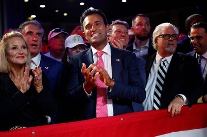 Vivek Ramaswamy (C) joins other supporters for an election night party with Republican presidential nominee, former U.S. President Donald Trump at the Palm Beach Convention Center on November 06, 2024 in West Palm Beach, Florida. (Getty Images via AFP) Vivek Ramaswamy (C) joins other supporters for an election night party with Republican presidential nominee, former U.S. President Donald Trump at the Palm Beach Convention Center on November 06, 2024 in West Palm Beach, Florida. (Getty Images via AFP)
