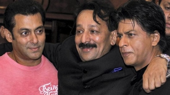 Baba Siddique, seen here with actors Salman Khan and Shah Rukh Khan during an Iftar party, also received threats from Bishnoi's gang, and was subsequently killed. (PTI file photo)