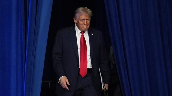 Republican presidential nominee former President Donald Trump arrives at an election night watch party at the Palm Beach Convention Center, Florida. (AP)