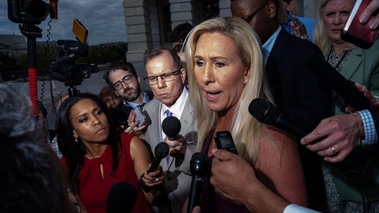 Marjorie Taylor Greene emphasized they stood with Trump from the start, mentioning that they “never backed down, never stabbed him in the back, never tried to beat him.” (Getty Images via AFP)