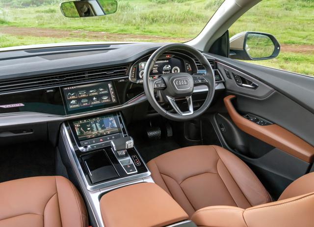 The Q8 has a Bang & Olufsen sound system, a panoramic sunroof, and soft-close doors. The Q8 has a Bang & Olufsen sound system, a panoramic sunroof, and soft-close doors.