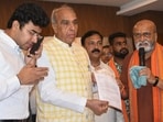 Hubballi: Joint Committee of Parliament on the Waqf (Amendment) Bill Chairman Jagdambika Pal shows a petition that he received after a meeting with local farmers regarding their lands being claimed by the State Waqf Board, in Hubballi, Karnataka.