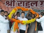 Lohardaga: Leader of Opposition in Lok Sabha and Congress leader Rahul Gandhi being garlanded during a public meeting in support of party candidate, Rameshwar Oraon ahead of the Jharkhand Assembly election, in Lohardaga district, Friday, Nov. 8, 2024. (PTI Photo) 