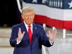 Republican then-presidential candidate and former U.S. President Donald Trump gestures during a campaign event at Dorton Arena, in Raleigh, North Carolina, U.S. November 4, 2024.   REUTERS/Jonathan Drake/File Photo