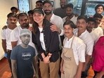 Virat Kohli and Anushka Sharma with Mumbai cafe staff Virat Kohli and Anushka Sharma with Mumbai cafe staff