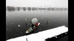 A view of the Dal Lake during snowfall in Srinagar in February this year. (Waseem Andrabi /Hindustan Times)