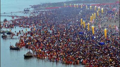Devotees offer prayers on the banks of the Ganga the last day of Chhath Puja in Patna on Friday. (PTI Photo) Devotees offer prayers on the banks of the Ganga the last day of Chhath Puja in Patna on Friday. (PTI Photo)
