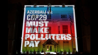 FILE PHOTO: Climate activists project a message onto the Embassy of Azerbaijan ahead of COP29 climate talks, in London, Britain, November 7, 2024. REUTERS/Chris J. Ratcliffe/File Photo (REUTERS) FILE PHOTO: Climate activists project a message onto the Embassy of Azerbaijan ahead of COP29 climate talks, in London, Britain, November 7, 2024. REUTERS/Chris J. Ratcliffe/File Photo (REUTERS)