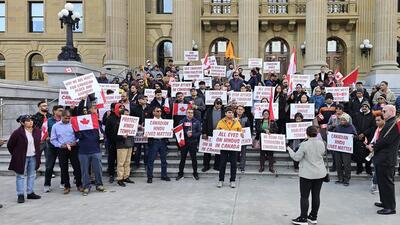 Members of the Indo-Canadian community stage a protest outside the Alberta legislature in Edmonton, Canada, on Thursday Members of the Indo-Canadian community stage a protest outside the Alberta legislature in Edmonton, Canada, on Thursday