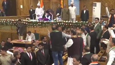 BJP members protesting inside Jammu and Kashmir assembly against special status resolution. (Screengrab) BJP members protesting inside Jammu and Kashmir assembly against special status resolution. (Screengrab)