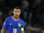 Kylian Mbappe in action for France. Kylian Mbappe in action for France.