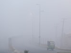 A view of vehicles amid smog along a highway in Multan, Pakistan November 8, 2024. 