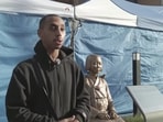 Johnny Somali apologised for kissing a statue in Korea, but faced continued backlash online.


