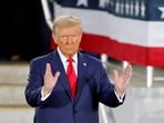 Republican then-presidential candidate and former U.S. President Donald Trump gestures during a campaign event at Dorton Arena, in Raleigh, North Carolina, U.S. November 4, 2024.   REUTERS/Jonathan Drake/File Photo