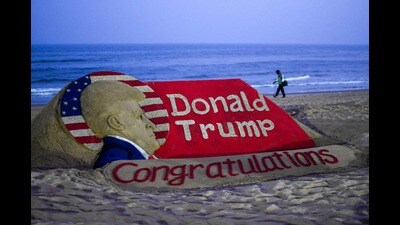 A sculpture made by Indian sand artist Sudarsan Pattnaik depicting former US president and Republican presidential candidate Donald Trump after he won a sweeping victory in the US presidential election in Puri of India's Odisha state on November 6, 2024.(Photo by AFP) (AFP) A sculpture made by Indian sand artist Sudarsan Pattnaik depicting former US president and Republican presidential candidate Donald Trump after he won a sweeping victory in the US presidential election in Puri of India's Odisha state on November 6, 2024.(Photo by AFP) (AFP)