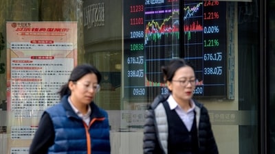 A screen displays stock figures in Beijing, China, on Thursday, Nov. 7, 2024. When Donald Trump first started a trade war with China in 2018, Beijing found itself on the back foot and unsure of how to respond. This time President Xi Jinping is better prepared for a fight, even as he has more to lose. Photographer: Na Bian/Bloomberg (Bloomberg) A screen displays stock figures in Beijing, China, on Thursday, Nov. 7, 2024. When Donald Trump first started a trade war with China in 2018, Beijing found itself on the back foot and unsure of how to respond. This time President Xi Jinping is better prepared for a fight, even as he has more to lose. Photographer: Na Bian/Bloomberg (Bloomberg)