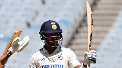 Indian batsman Dhruv Jurel acknowledges the applause after scoring his half-century during the Australia A against India A cricket match at the Melbourne Cricket Ground (MCG). (AFP) Indian batsman Dhruv Jurel acknowledges the applause after scoring his half-century during the Australia A against India A cricket match at the Melbourne Cricket Ground (MCG). (AFP)