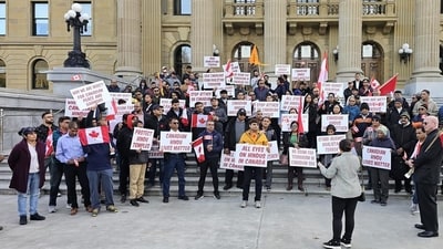 Members of the Indo-Canadian community stage a protest outside the Alberta legislature in Edmonton, Canada, on Thursday