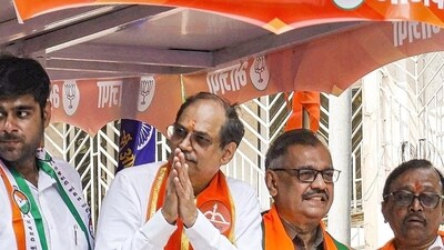 Mumbai: BJP MLA Parag Alavani along with party leader Ujjwal Nikam on the way to file his nomination papers for Maharashtra Assembly elections, in Mumbai, Thursday, Oct. 24, 2024. (PTI Photo) (PTI10_24_2024_000213B) (PTI) Mumbai: BJP MLA Parag Alavani along with party leader Ujjwal Nikam on the way to file his nomination papers for Maharashtra Assembly elections, in Mumbai, Thursday, Oct. 24, 2024. (PTI Photo) (PTI10_24_2024_000213B) (PTI)