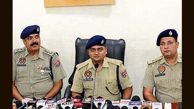 Police officials at a press conference after arresting the accused in Ludhiana on Saturday. (HT Photo) Police officials at a press conference after arresting the accused in Ludhiana on Saturday. (HT Photo)