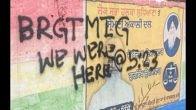 The defaced public and private walls on the Southern Bypass road in Ludhiana. (HT Photo)