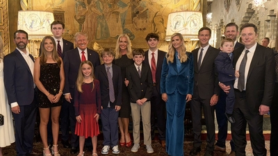 Elon Musk and his son X Æ A-Xii (second right) pose with Trump's family. (X/@KaiTrumpGolfs)