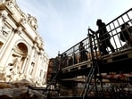 People walk along an elevated walkway that gives limited access to the Trevi Fountain monument during maintenance work in Rome. Rome's Trevi Fountain tour revamped: Book your spot for a 30-minute, no-crowd experience People walk along an elevated walkway that gives limited access to the Trevi Fountain monument during maintenance work in Rome. Rome's Trevi Fountain tour revamped: Book your spot for a 30-minute, no-crowd experience