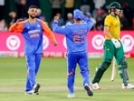 India's Varun Chakaravarthy and Suryakumar Yadav celebrate the dismissal of South Africa's Marco Jansen during the 2nd T20I. India's Varun Chakaravarthy and Suryakumar Yadav celebrate the dismissal of South Africa's Marco Jansen during the 2nd T20I.