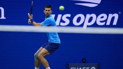 Novak Djokovic, of Serbia, returns a shot. (AP) Novak Djokovic, of Serbia, returns a shot. (AP)