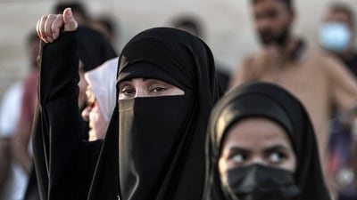 Women attend a demonstration in support of a proposed parliamentary amendment to the Personal Status Law in Baghdad. (File image) (AFP) Women attend a demonstration in support of a proposed parliamentary amendment to the Personal Status Law in Baghdad. (File image) (AFP)