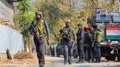 Security personnel during an encounter with terrorists at Sagipora area of Sopore, in Baramulla district, J&K. (PTI)