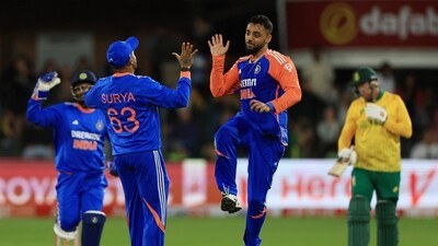 India's Varun Chakaravarthy celebrates after taking the wicket of South Africa's Heinrich Klaasen. (REUTERS)