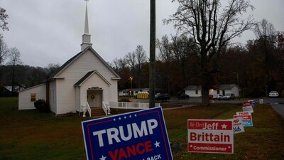 FEMA fires employee for telling other workers to avoid houses with Trump signs (Getty Images via AFP) FEMA fires employee for telling other workers to avoid houses with Trump signs (Getty Images via AFP)