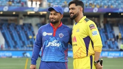 MS Dhoni and Rishabh Pant pose for a photograph. MS Dhoni and Rishabh Pant pose for a photograph.
